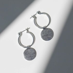 Sterling Silver Omega Drop Earrings in sunlight