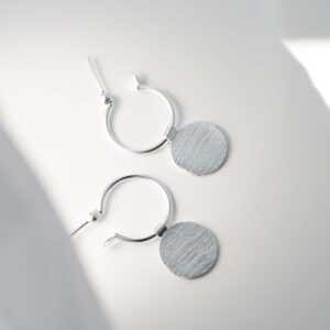 Sterling Silver Omega Drop Earrings in sunlight