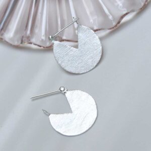 Sterling Silver Stolen Slice Earrings on jewellery dish