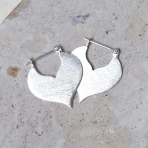Sterling Silver Love Leaf Drop Earrings on jewellery dish