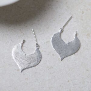 Sterling Silver Love Leaf Drop Earrings on jewellery dish