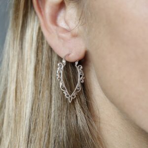 Sterling Silver Harmony Hoops in ear of model