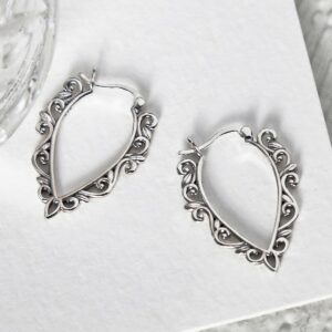 Sterling Silver Harmony Hoops featuring pattern on white background