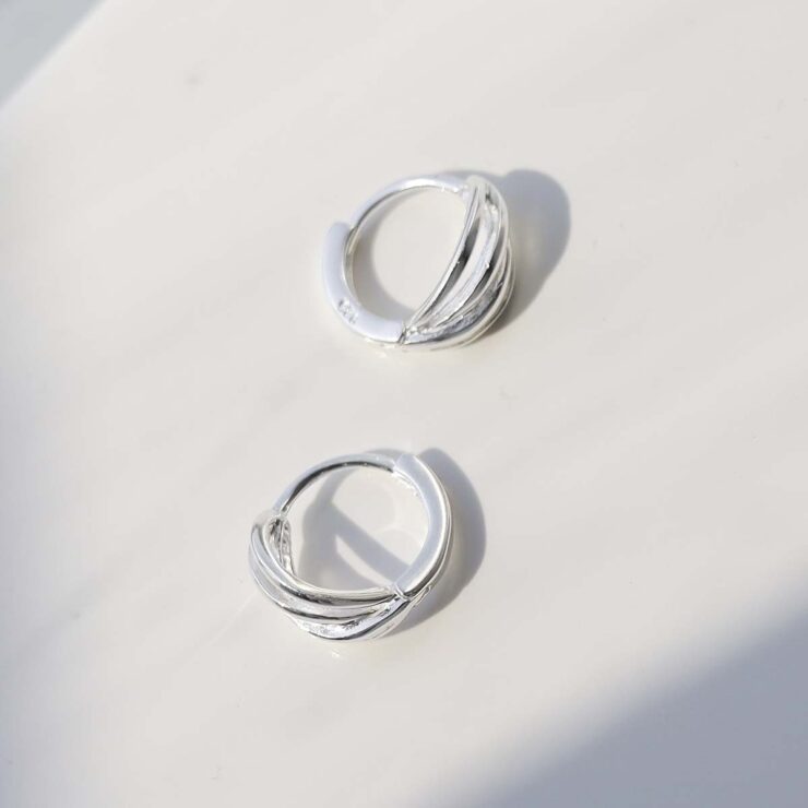 Sterling Silver Braided Huggies in sun