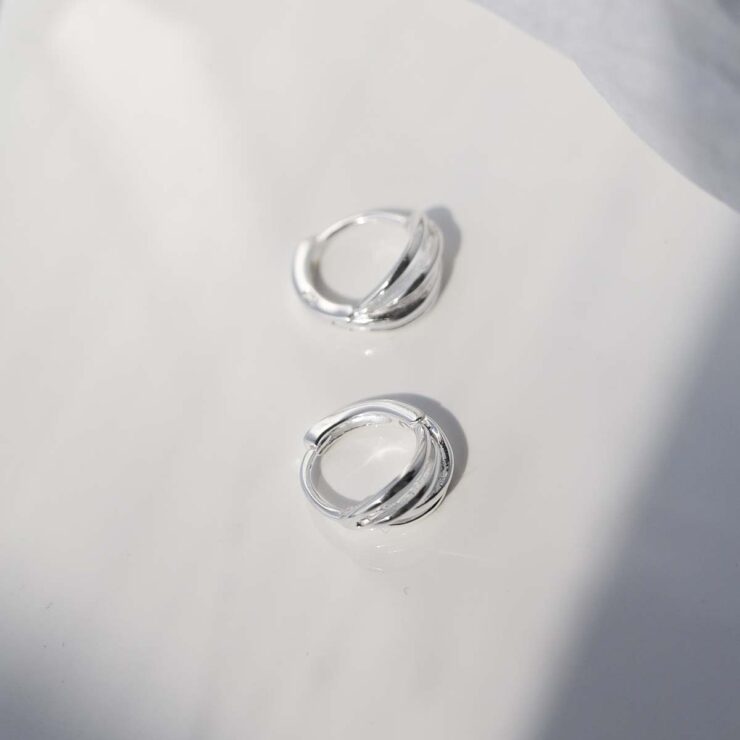 Sterling Silver Braided Huggies in sun