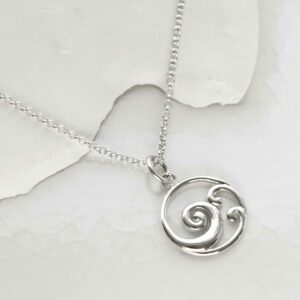 STERLING SILVER OCEAN WAVE NECKLACE on a white background