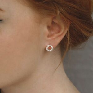 swinging pearl studs on model with Red hair