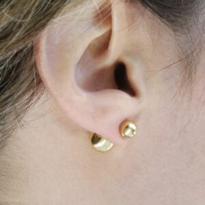 Gold Plated Venus Stud Earrings on a model