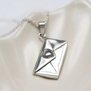 Sterling Silver Love Letter Locket in jewellery dish