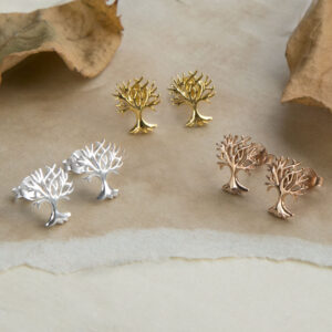 All 3 finishes of the Sterling Silver Tree Stud Dangly Earrings in silver, gold, and rose gold