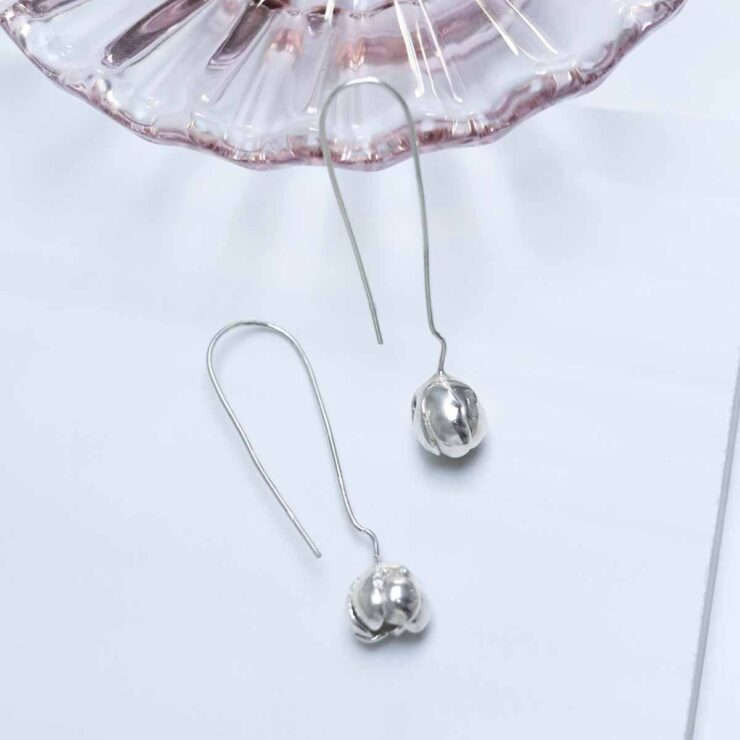 Sterling Silver Blossom Drop Earrings in jewellery dish
