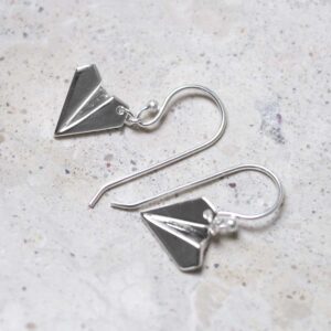 Sterling Silver Dangly Paper Airplane Earrings in jewellery tray