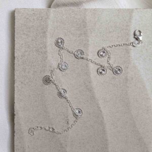 Sterling Silver Diamond Disc Bracelet on jewellery dish