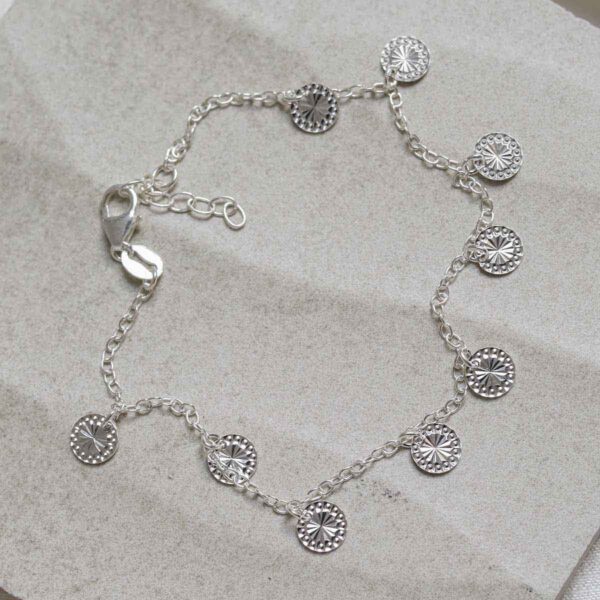 Sterling Silver Diamond Disc Bracelet on jewellery dish