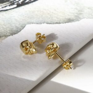 sterling silver mini gold skull studs showing facial detail