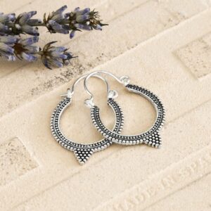 Silver Hooops with intricate Circle Oxidised Detail on a terracotta tile with Dried Lavender