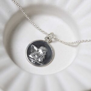 Engravable Sterling Silver Cherub Necklace in jewellery dish