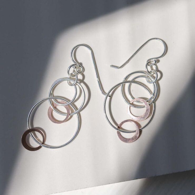 Sterling Silver And Rose Gold Swinging Circles Dangly Earrings