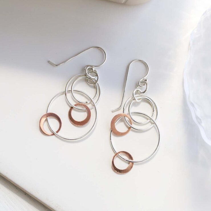 Sterling Silver And Rose Gold Swinging Circles Dangly Earrings