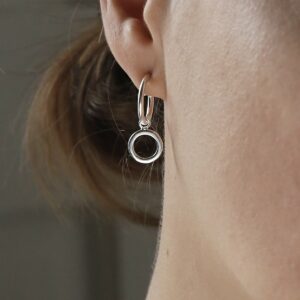 sterling silver circle hoop studs on model