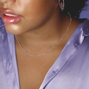 sterling silver triple ball necklace worn by model