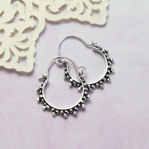 Silver and Oxidised Hoops with circular ball detail pattern on purple Watercolour background with Layered Cream Cut out Pattern paper