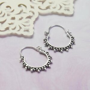 Silver and Oxidised Hoops with circular ball detail pattern on purple Watercolour background with Layered Cream Cut out Pattern paper