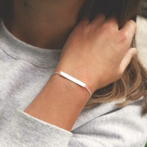 model wearing plain sterling silver adjustable identity bracelet