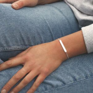 model wearing plain sterling silver adjustable identity bracelet