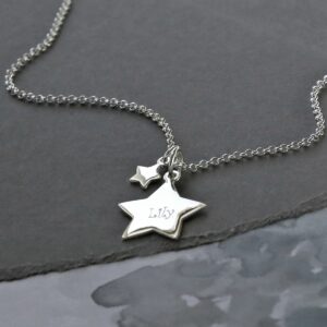 Sterling Silver Double Star Necklace on slate