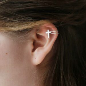 Sterling silver ear cuff round the top of a girls ear