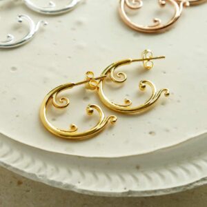 Gold plated Baroque Hoop White Plaster Detail Background