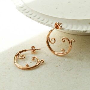 Rose Gold plated Baroque Hoop White Plaster Detail Background