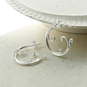 Sterling Silver Baroque Hoop White Plaster Detail Background