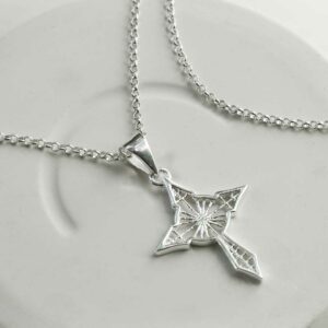 STERLING SILVER STAR CROSS PENDANT NECKLACE ON GREY BACKGROUND