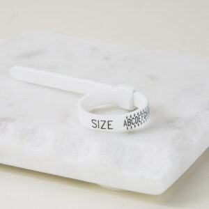 Ring Sizer on white tile