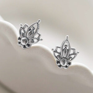Sterling Silver Mini Botanical Studs on jewellery dish