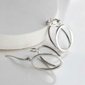 Double Oval Loops on white background one earring open