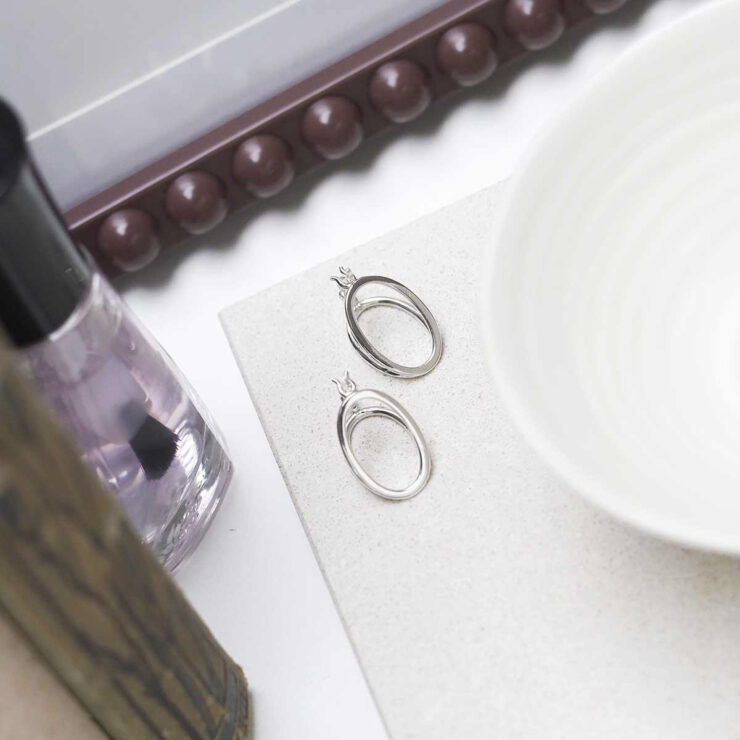 Sterling Silver Double Oval Loop Hoops on table