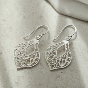 silver fleur de lis earrings in sunshine and shadows