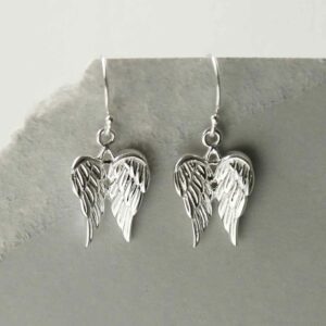 silver attached wings dangly earrings hanging