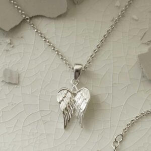 silver attached wings necklace on plain chain