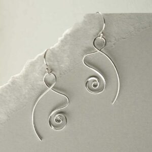 silver spiralling ribbon earrings hanging