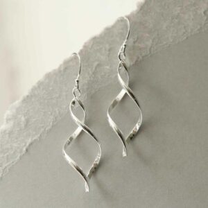 silver twisted ellipse earrings hanging