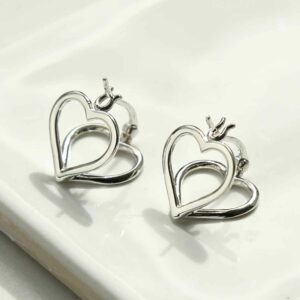 silver double fused heart hoops on tile