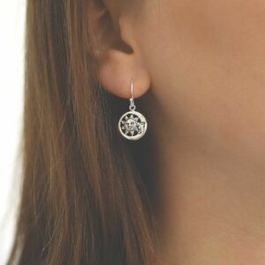 silver vintage sun and moon earrings on model