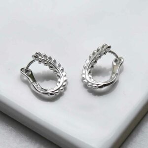 silver leafy crown hoops on tile