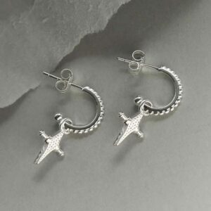 silver glitzy cross hoop studs sideways