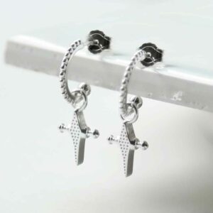 silver glitzy cross hoop studs hanging