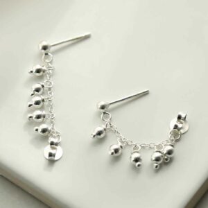 silver lamps on double stud chain strewn